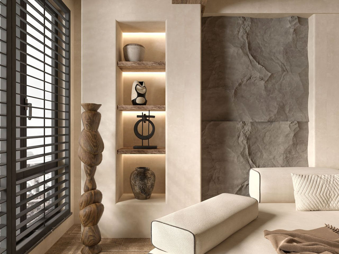 A wide horizontal view of a singular sculptural wall object in a luxury interior; image found on Mitsooz to illustrate how art can refuse a room to create deeper tension.