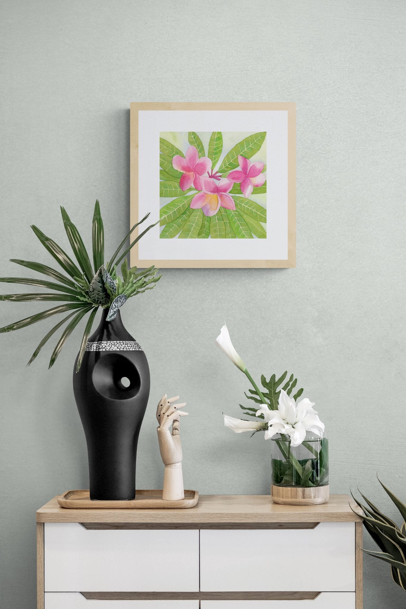 69f2ad89a10cdd42a53ee007_white-cabinet-with-tropical-plants_1779401174039.jpg