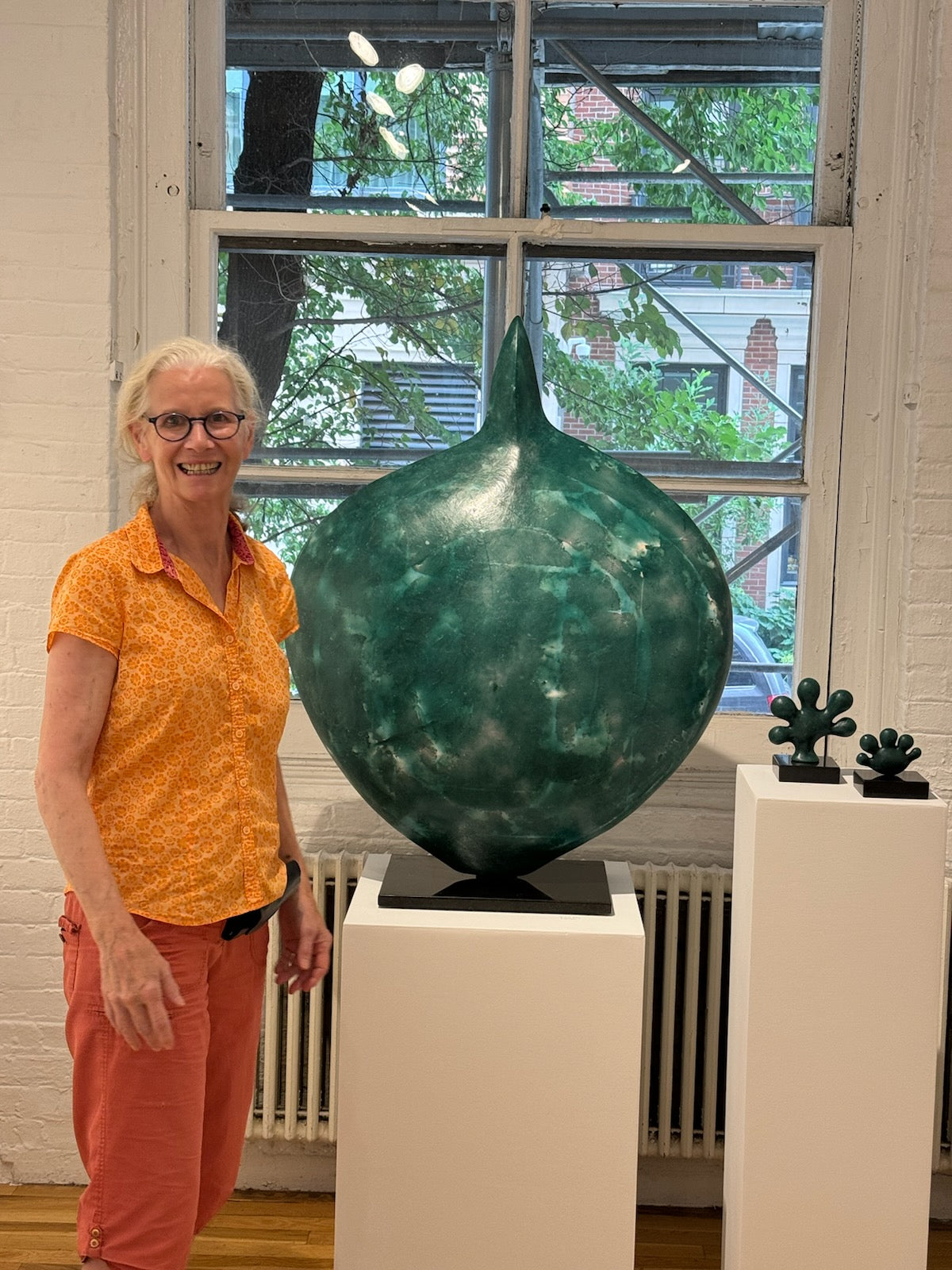 A portrait of sculptor Andree Brown. Her practice is defined by the intersection of sensory translation and the preservation of ephemeral beauty: capturing the movement of nature through a lens of American and European influences. Mitsooz.