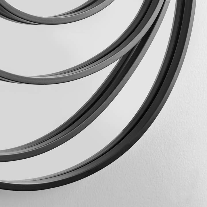 Sonya Continuous Circles Wall Mirror – 25.5-Inch with Black Iron Frame