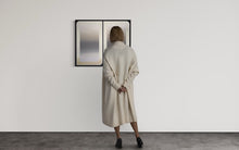 A 30x36 original atmospheric abstract painting titled The View 2 by Kevin Cross being viewed by a collector in a minimalist gallery setting on Mitsooz.