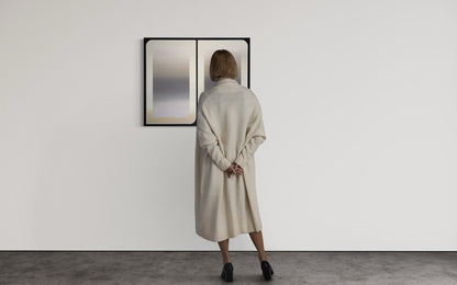 A 30x36 original atmospheric abstract painting titled The View 2 by Kevin Cross being viewed by a collector in a minimalist gallery setting on Mitsooz.