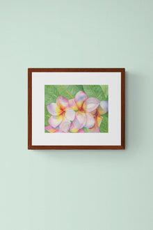 A horizontal 11x14 original botanical watercolor painting titled The Pink Plumeria Blooms by Ruth Wall, featuring vibrant pink and yellow tropical flowers with lush green leaves in a mahogany frame on Mitsooz.