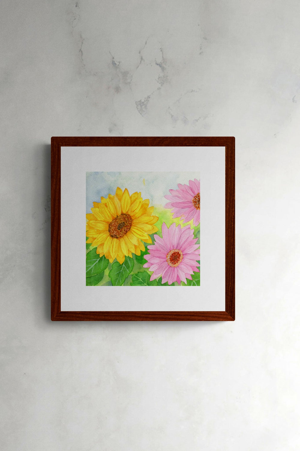 Square original botanical watercolor titled Pink and Yellow Gerbera Daisy by Ruth Wall featuring sunlit blooms in a mahogany frame on Arches paper at Mitsooz.