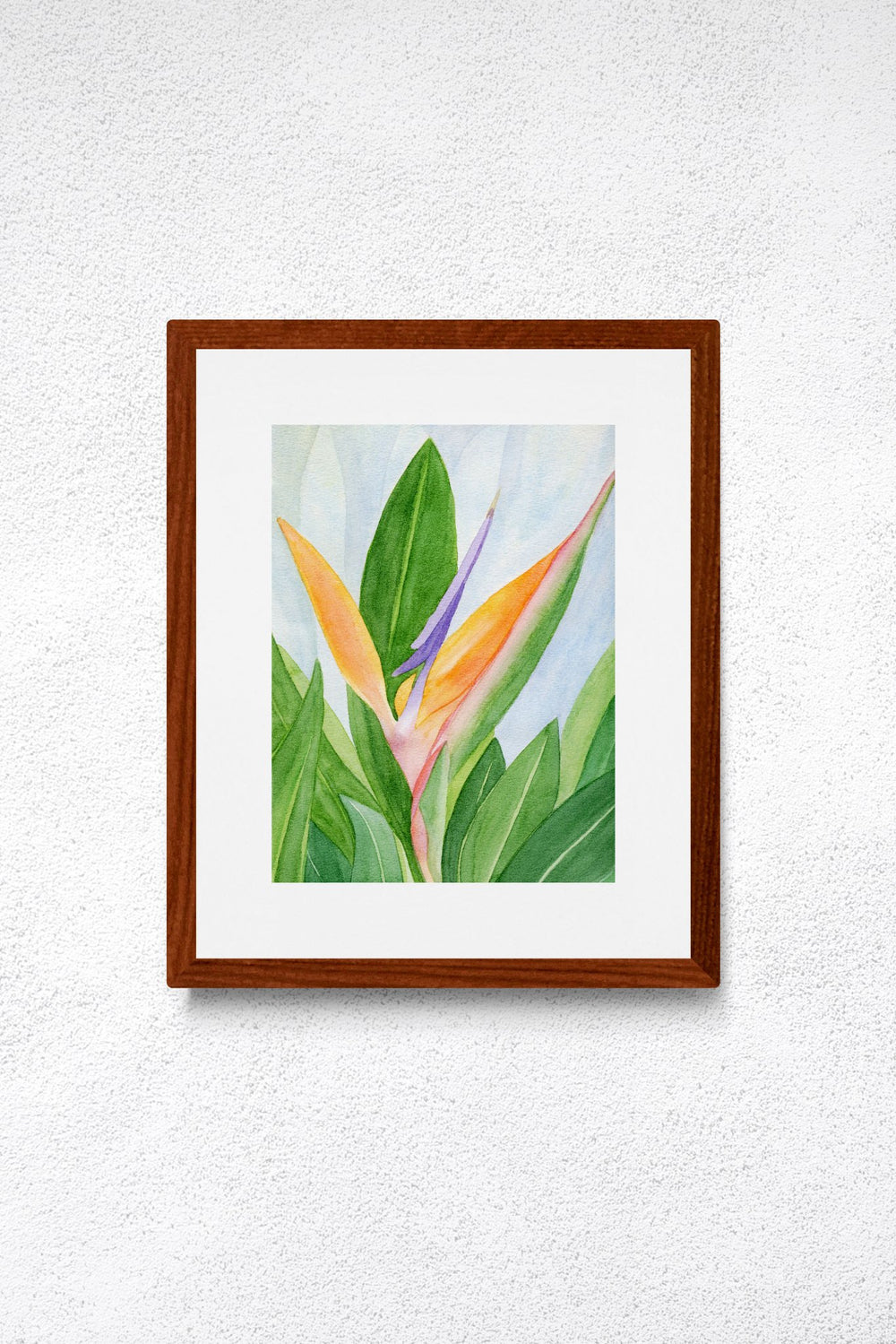 A vertical original botanical watercolor painting titled Words of Paradise by Ruth Wall featuring a vibrant orange and purple Bird of Paradise flower in a mahogany frame on Mitsooz.